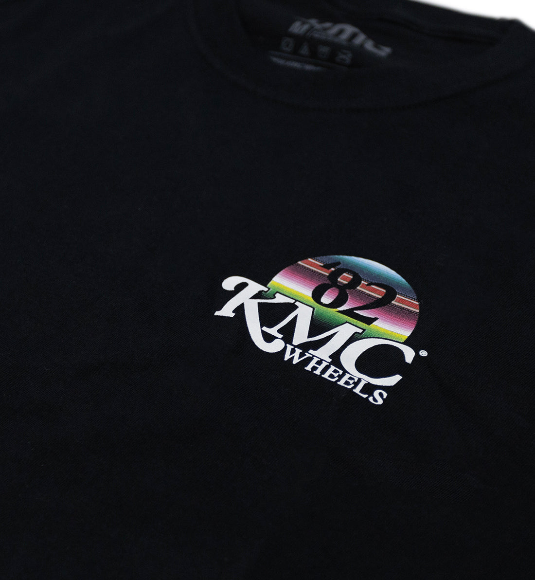 KMC DAY ONE Short Sleeve Tee in black featuring bold white graphics on the front.