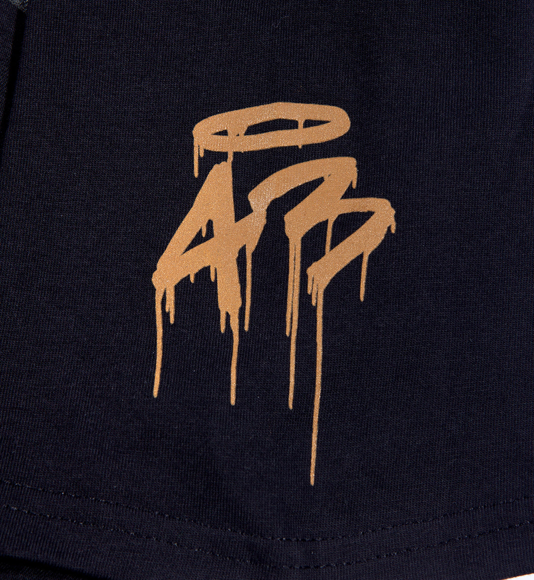 Black short sleeve tee with gold graffiti-style "GYMKHANA7 HITS" logo design.
