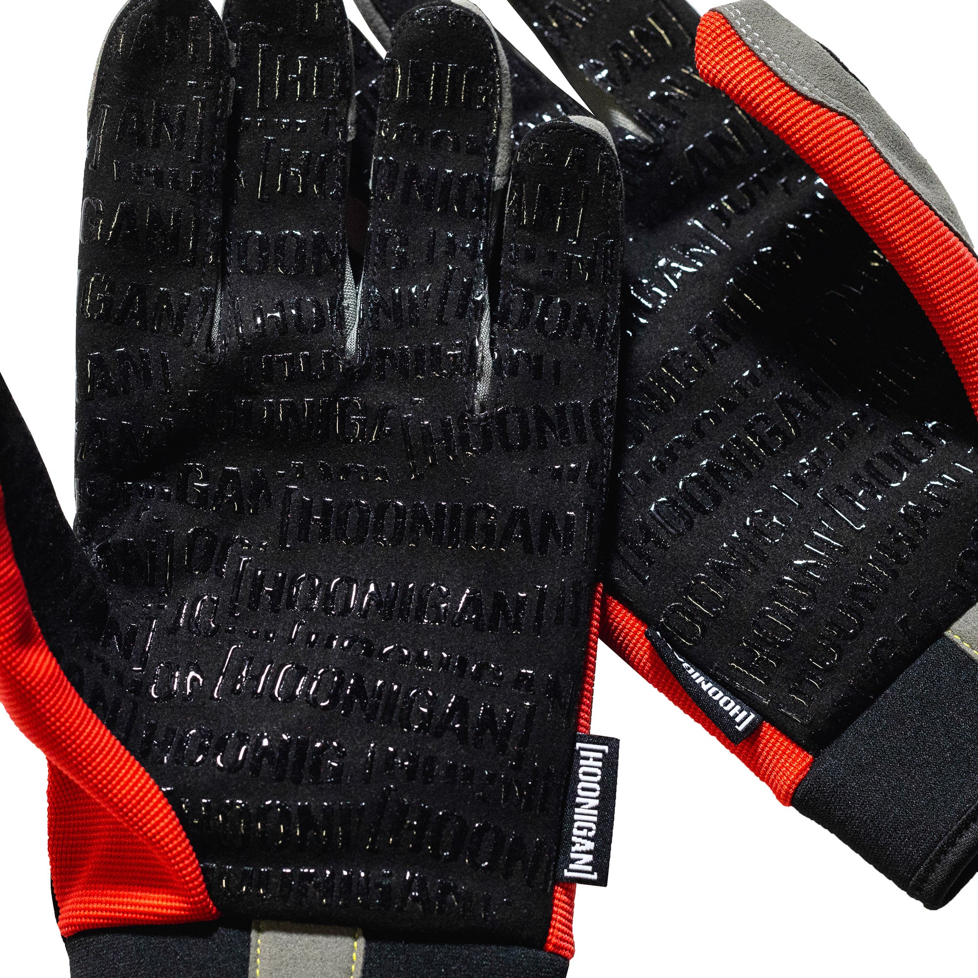 Hoonigan Surgeon General gloves featuring a bold black design with white text and graphics, ideal for motorsports and automotive enthusiasts.