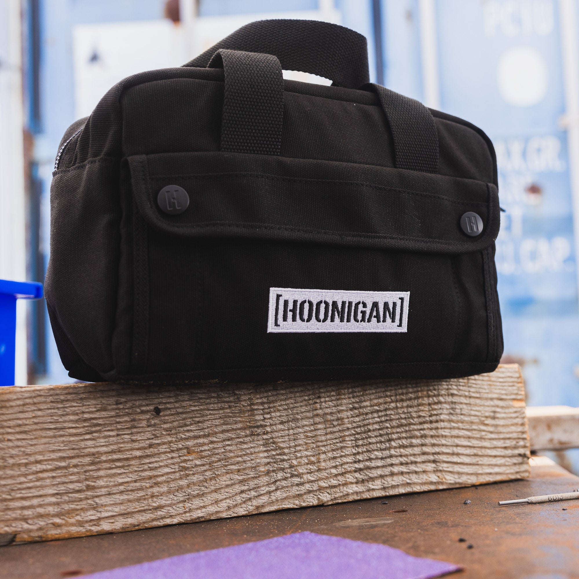 Hoonigan CENSOR BAR Tool Bag, showcasing durable black fabric with bold logo and multiple compartments for tools.