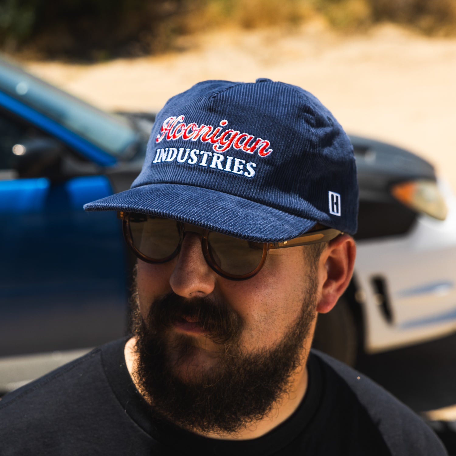 Hoonigan ROCKIES unstructured snapback hat in black with white logo detail on the front.
