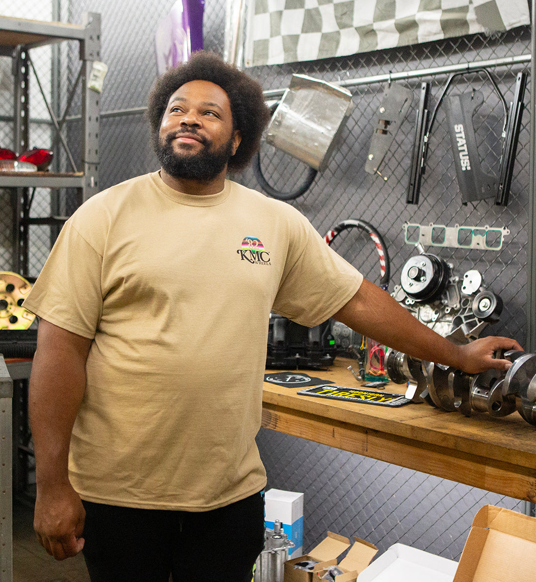 KMC DAY ONE Short Sleeve Tee in heather gray, featuring a relaxed fit and casual style, displayed on a model in a lifestyle setting.