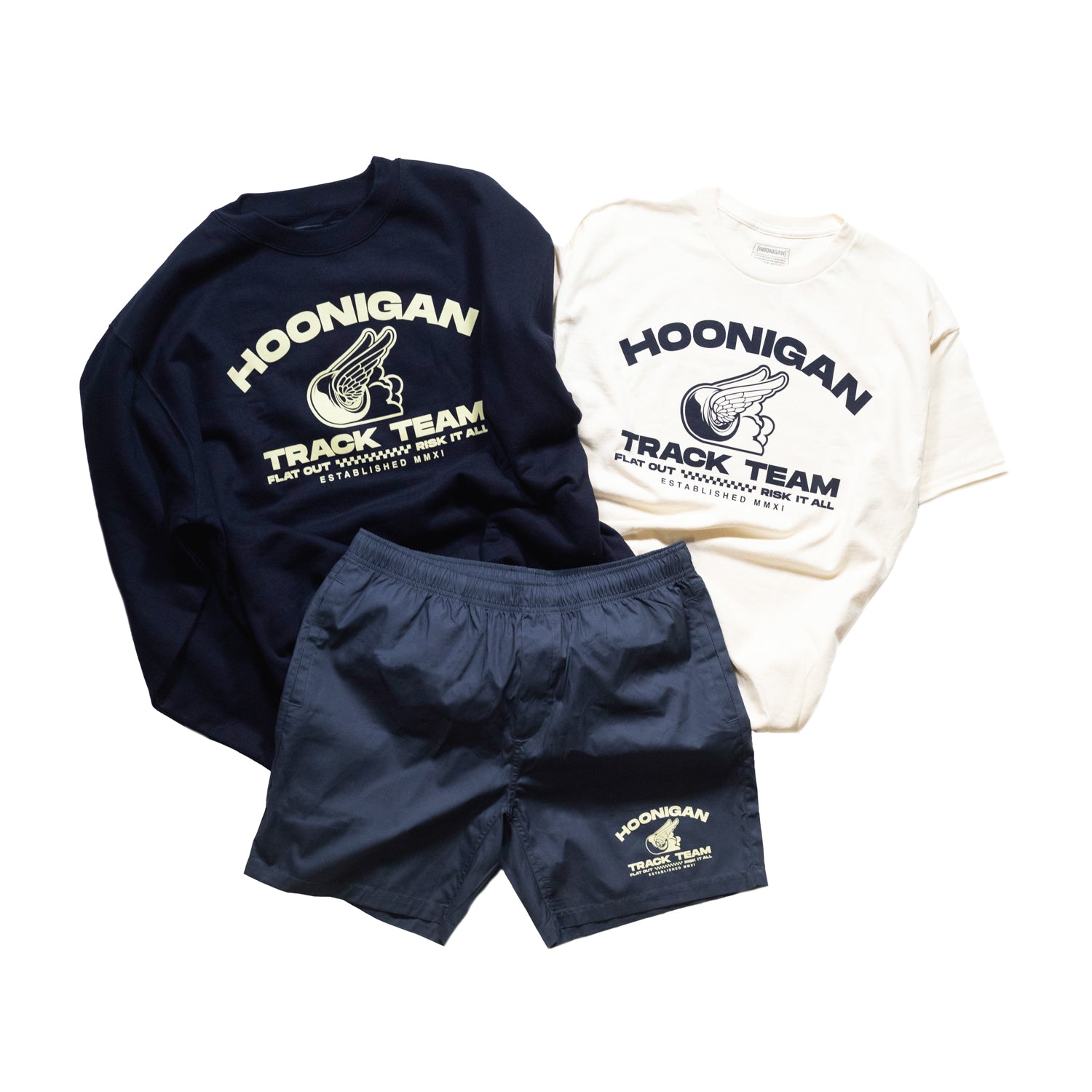 Hoonigan TRACK TEAM Short Sleeve Tee featuring a bold graphic design and vibrant colors on a black fabric background.