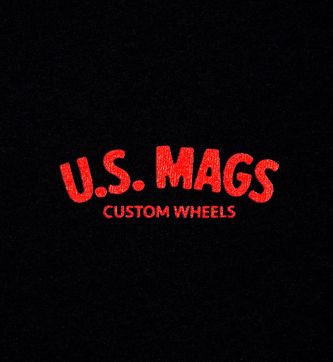US Mags short sleeve tee featuring a red logo on a black background, showcasing a casual and stylish design.
