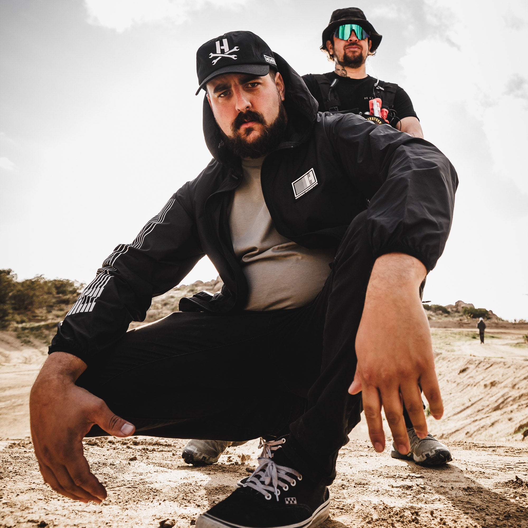 Hoonigan Motorsports windbreaker jacket in black with colorful logo and graphics.