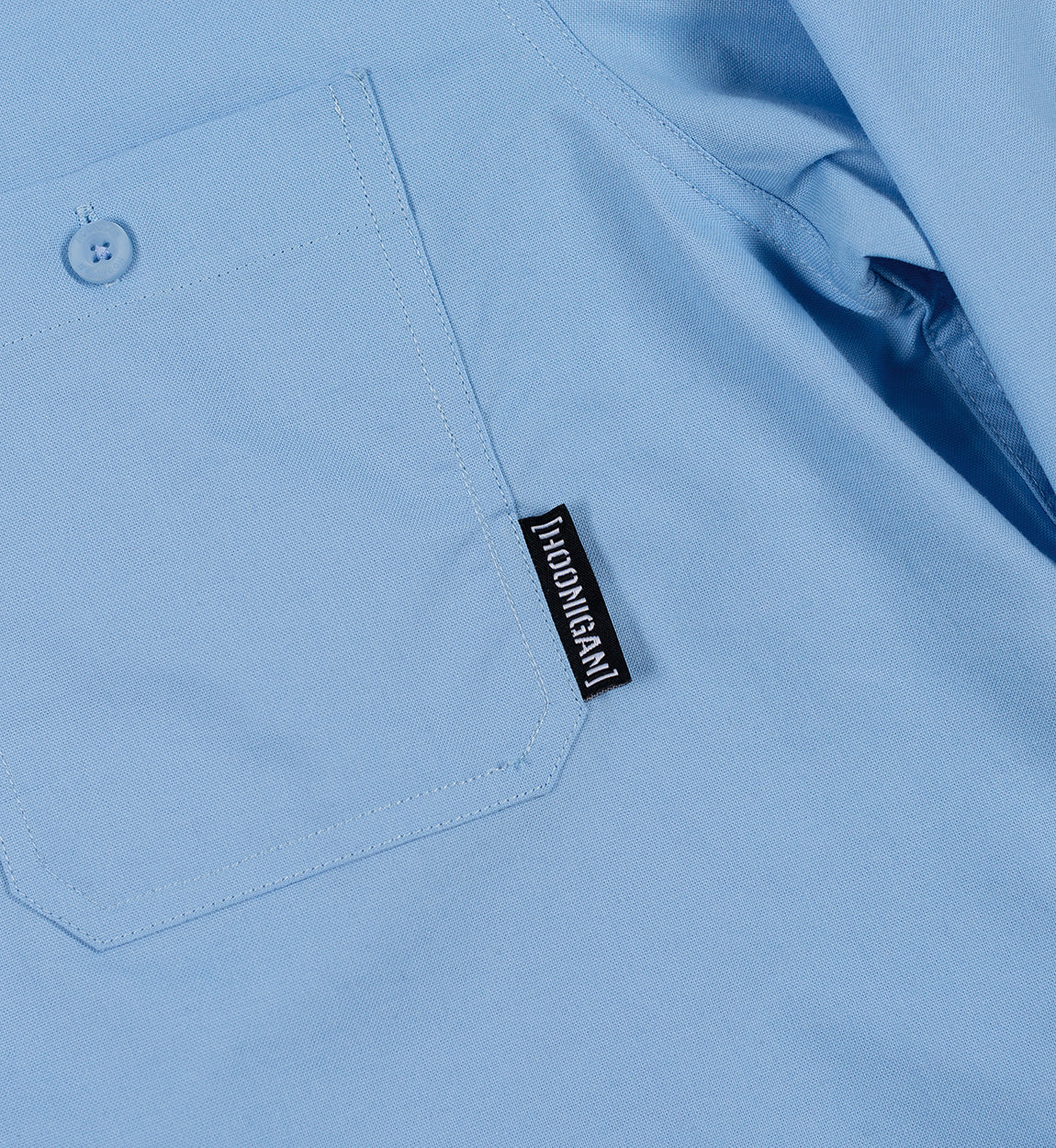 Hoonigan Evening Oxford Woven Long Sleeve Dress Shirt in light blue, featuring a classic collar and button-up front.