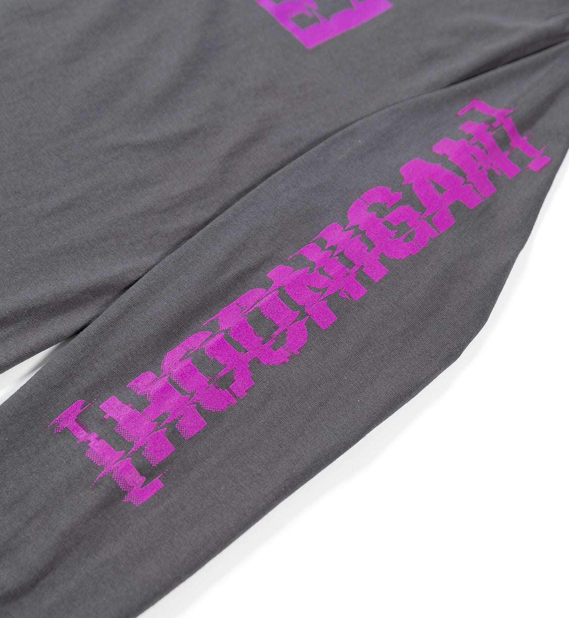 Long sleeve grey tee with purple "Glitch Bracket" text design printed along the sleeve.