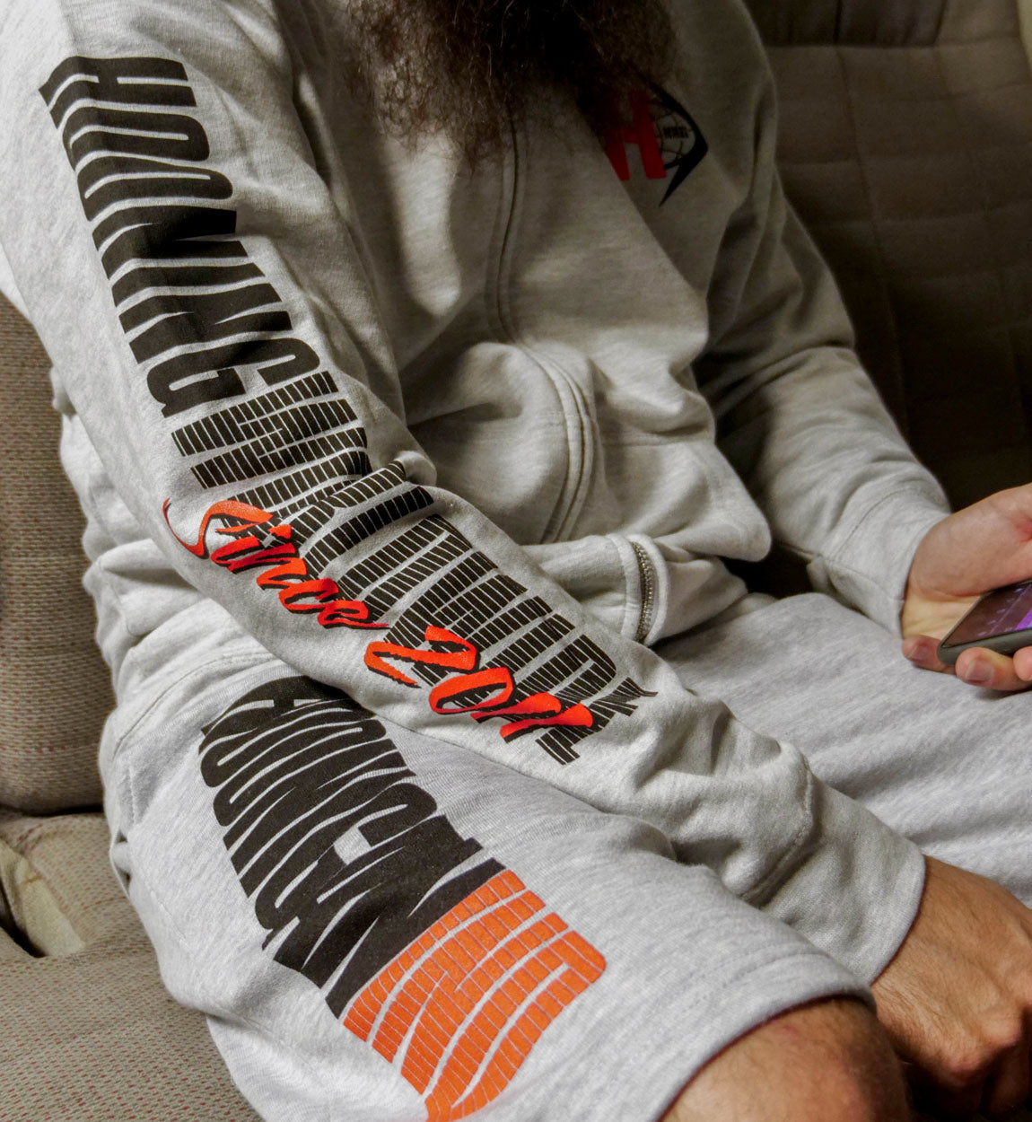 Hoonigan WORLDWIDE gray fleece shorts with logo detailing and drawstring waistband.