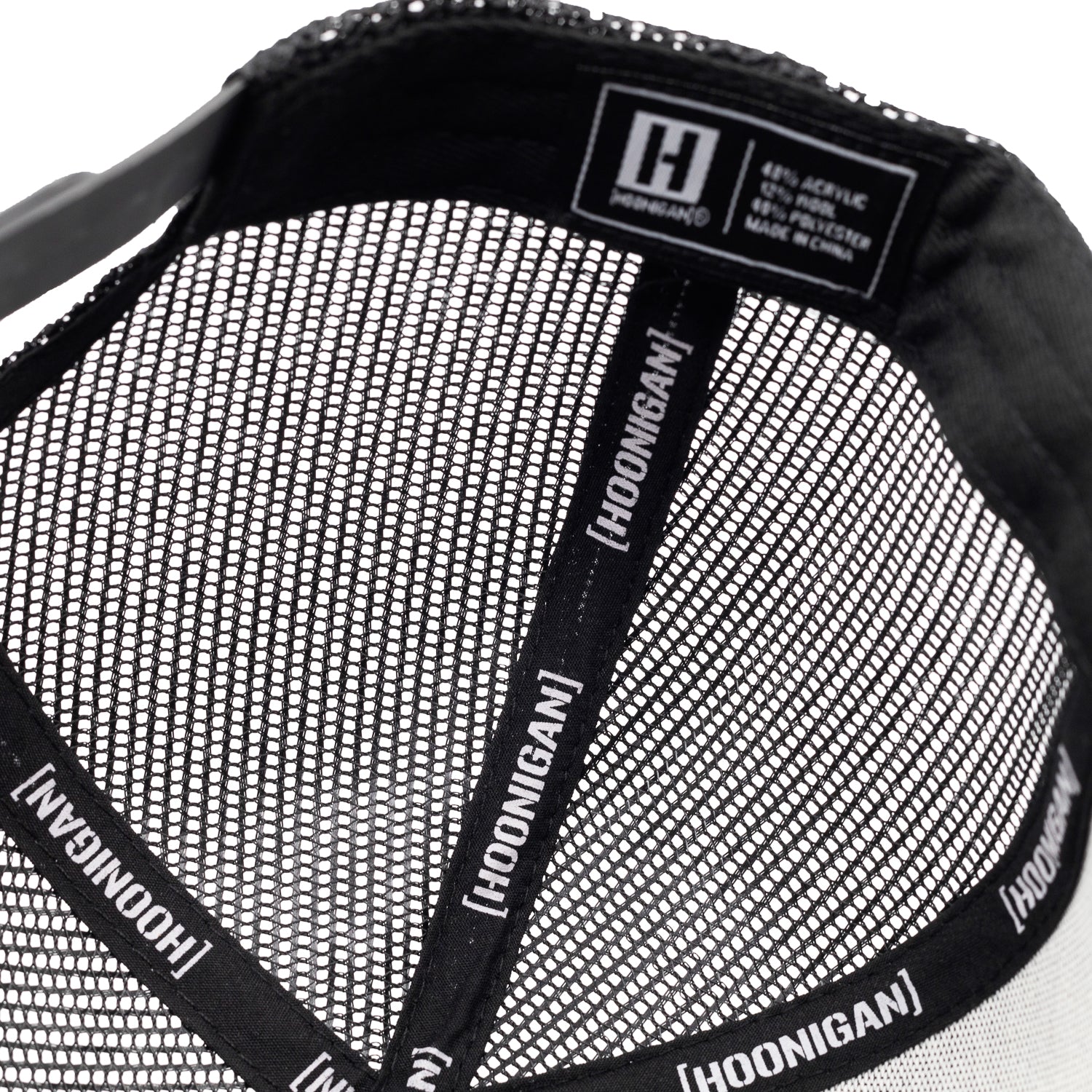KMC TROPHY LIFE Trucker Hat in black and white, featuring a mesh back and adjustable snap closure.