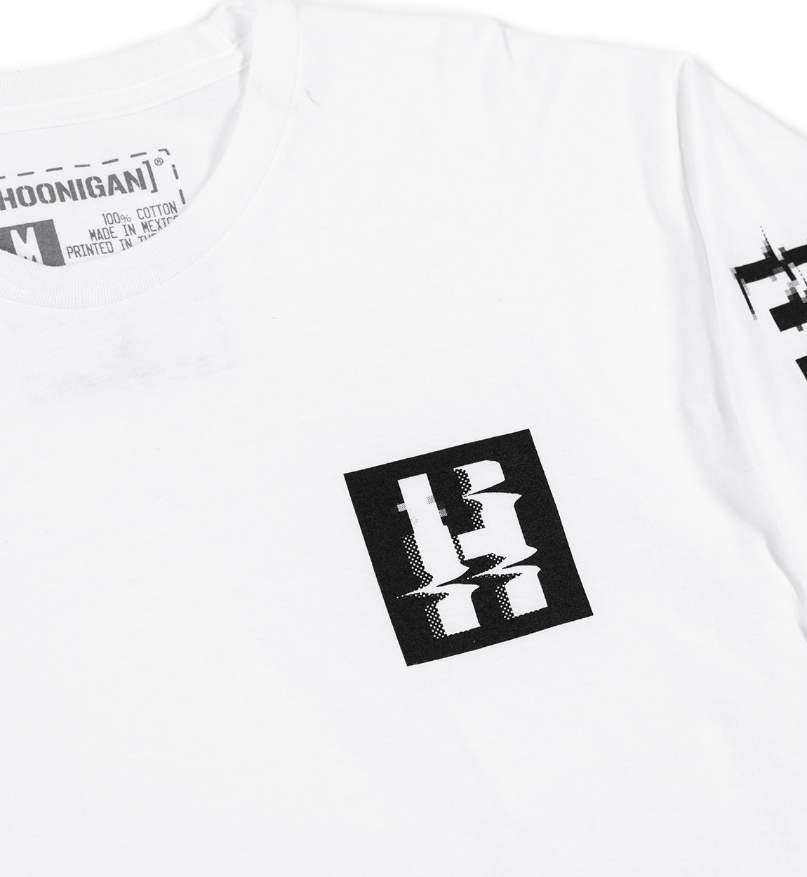White long sleeve tee with a black glitch-style logo on the chest and partial logo on the sleeve.